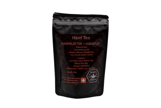 Hanf Tee mit Hibiskus offen 40g in schwarzer Verpackung mit goldener Schrift. Enthält Hanfblätter und Hibiskus für eine beruhigende Teemischung.